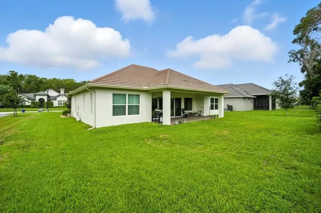 a view of an house with backyard space