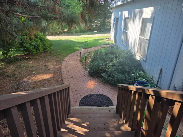 a picture of a glass door with a glass door and mirror