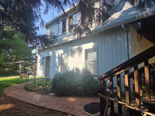 a view of a house with garden