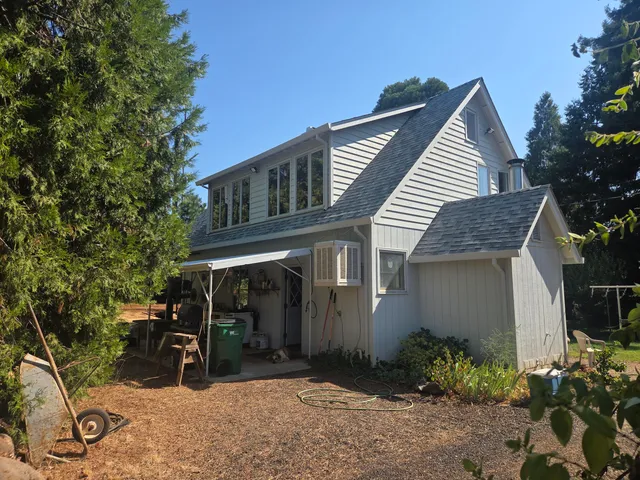 a view of a balcony with wooden floor