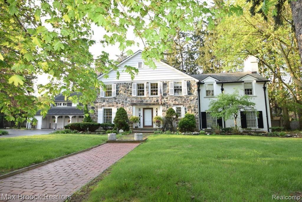 Authentic stone exterior on the English Manor style home