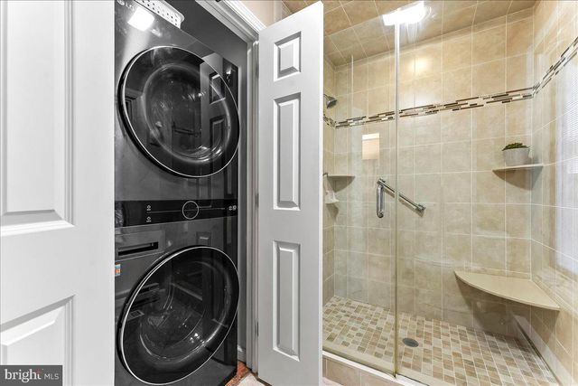 a living room with furniture fireplace and flat screen tv