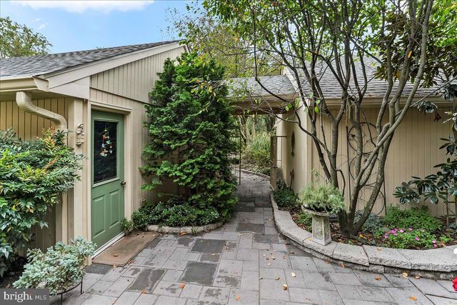 a view of a back yard of the house