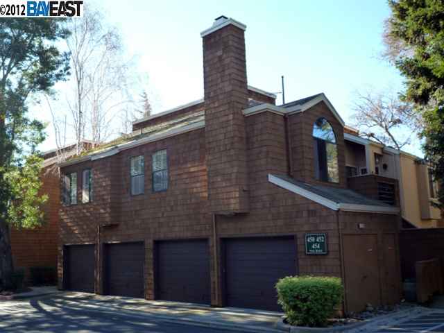 454 Pine Ridge Drive, Unit 219 San Ramon, CA 94582 - Photo 1 of 1 a brick building with a large windows