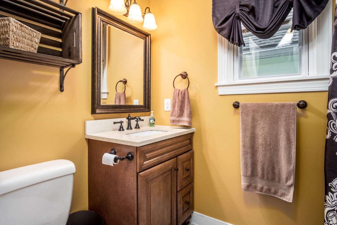 1794 Mt Torrey Road Lyndhurst, VA 22952 - Photo 36 of 44 a bathroom with a sink a mirror and a toilet