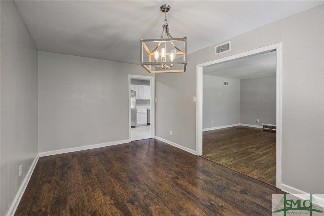 305 Tanglewood Road Savannah, GA 31419 - Photo 12 of 36 Formal dining area, front living room to the right