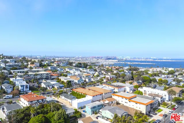 an aerial view of a city with lots of residential buildings