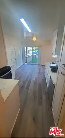 a view of empty room with windows