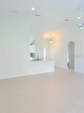 an empty room with a bathroom