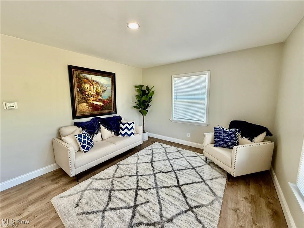 1644 Canton Road Akron, OH 44312 - Photo 9 of 25 Living area with baseboards, wood finished floors, and recessed lighting
