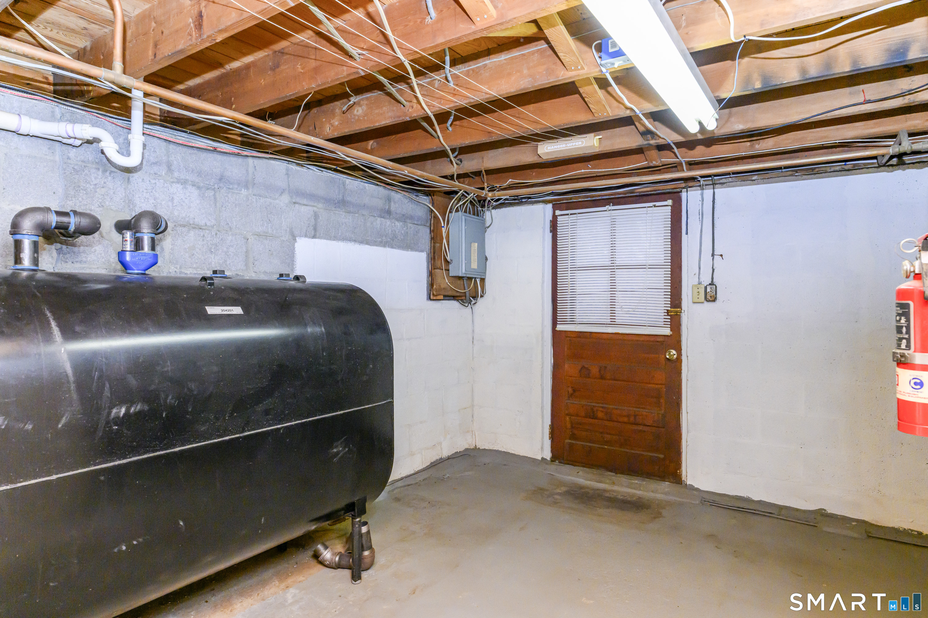 39 Rocky Ledge Drive Clinton, CT 06413 - Photo 32 of 40 Newer oil tank gives you peace of mind.