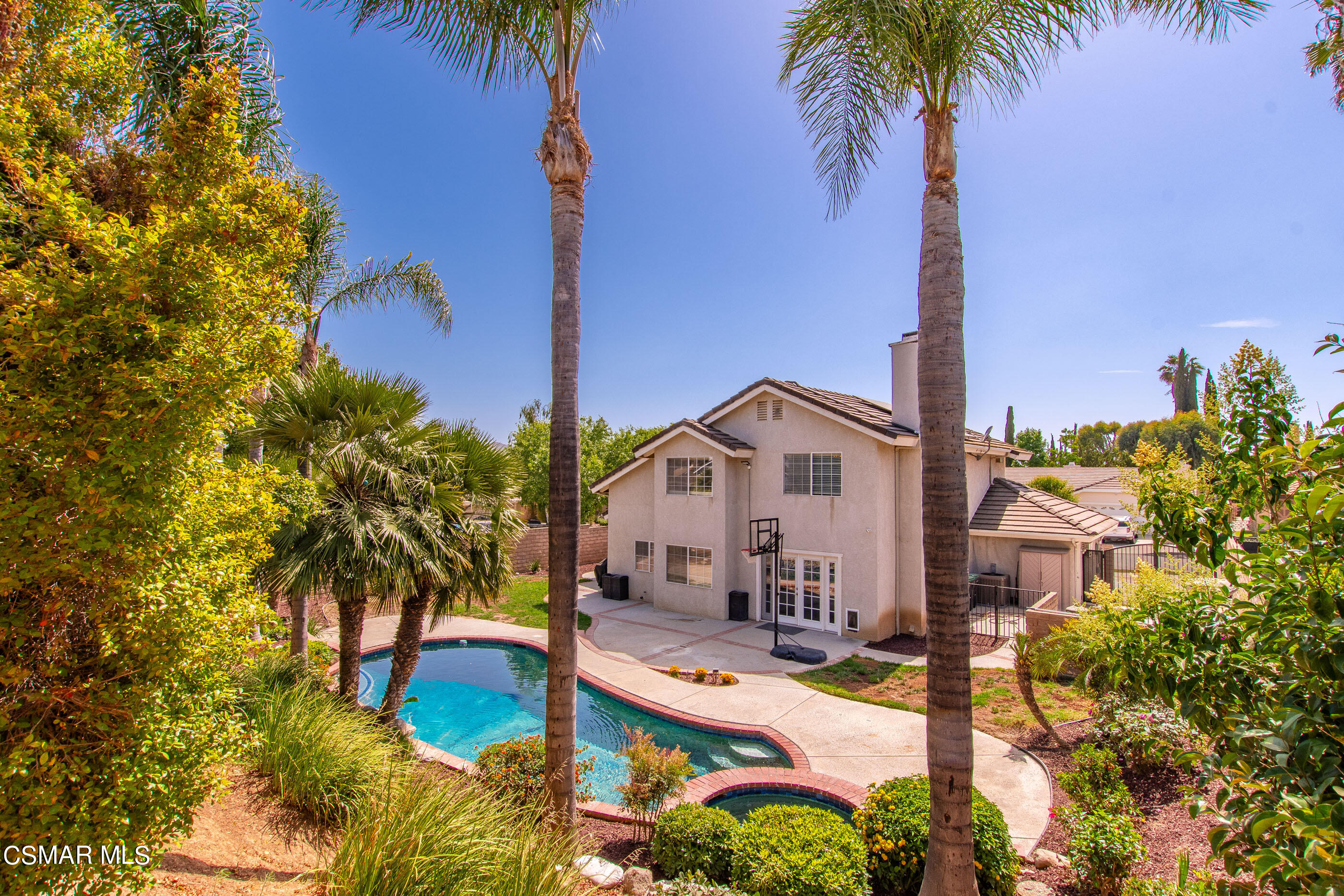 2708 Angel Circle Simi Valley, CA 93063 - Photo 20 of 26 a view of a house with a poll and yard