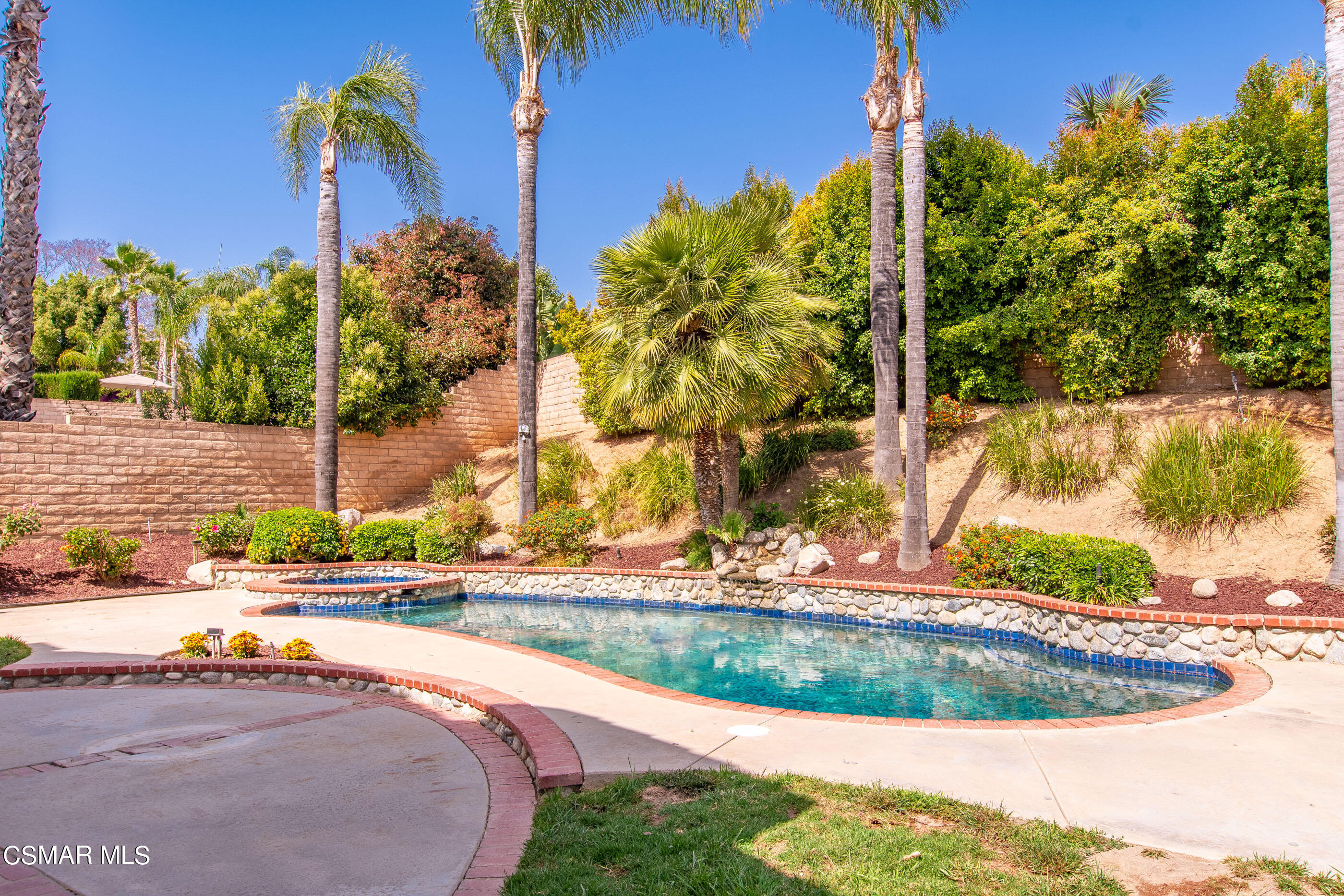 2708 Angel Circle Simi Valley, CA 93063 - Photo 24 of 26 a view of a swimming pool with a yard