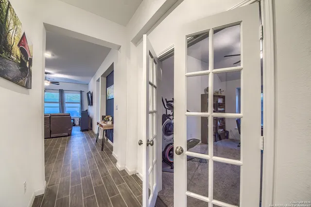 a view of entryway with livingroom and wooden floor