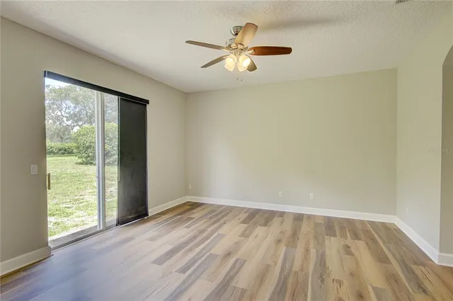 a bathroom with a sink a toilet and a window