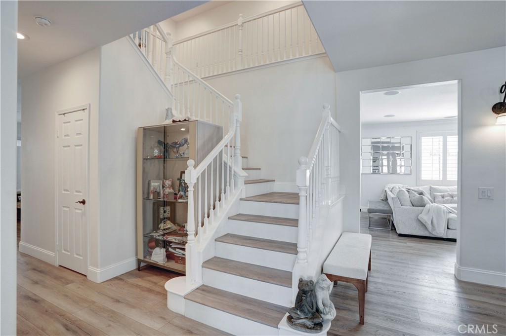 43041 Noble Court Temecula, CA 92592 - Photo 31 of 62 a view of entryway and hall with wooden floor
