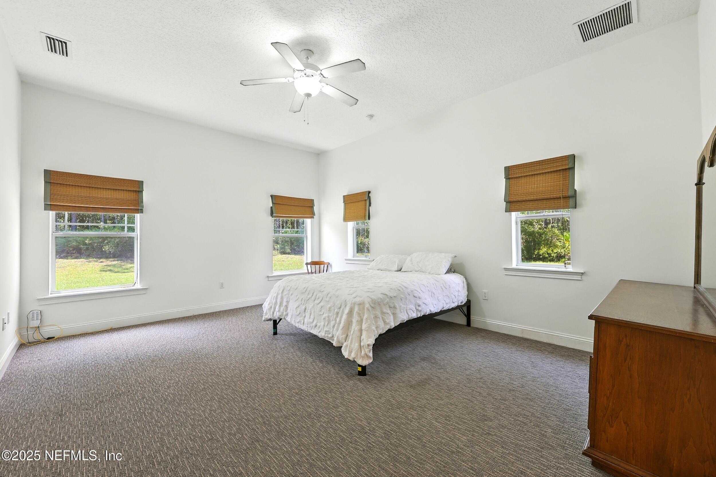 11062 Blazing Ridge Court Jacksonville, FL 32219 - Photo 22 of 55 Primary Bedroom