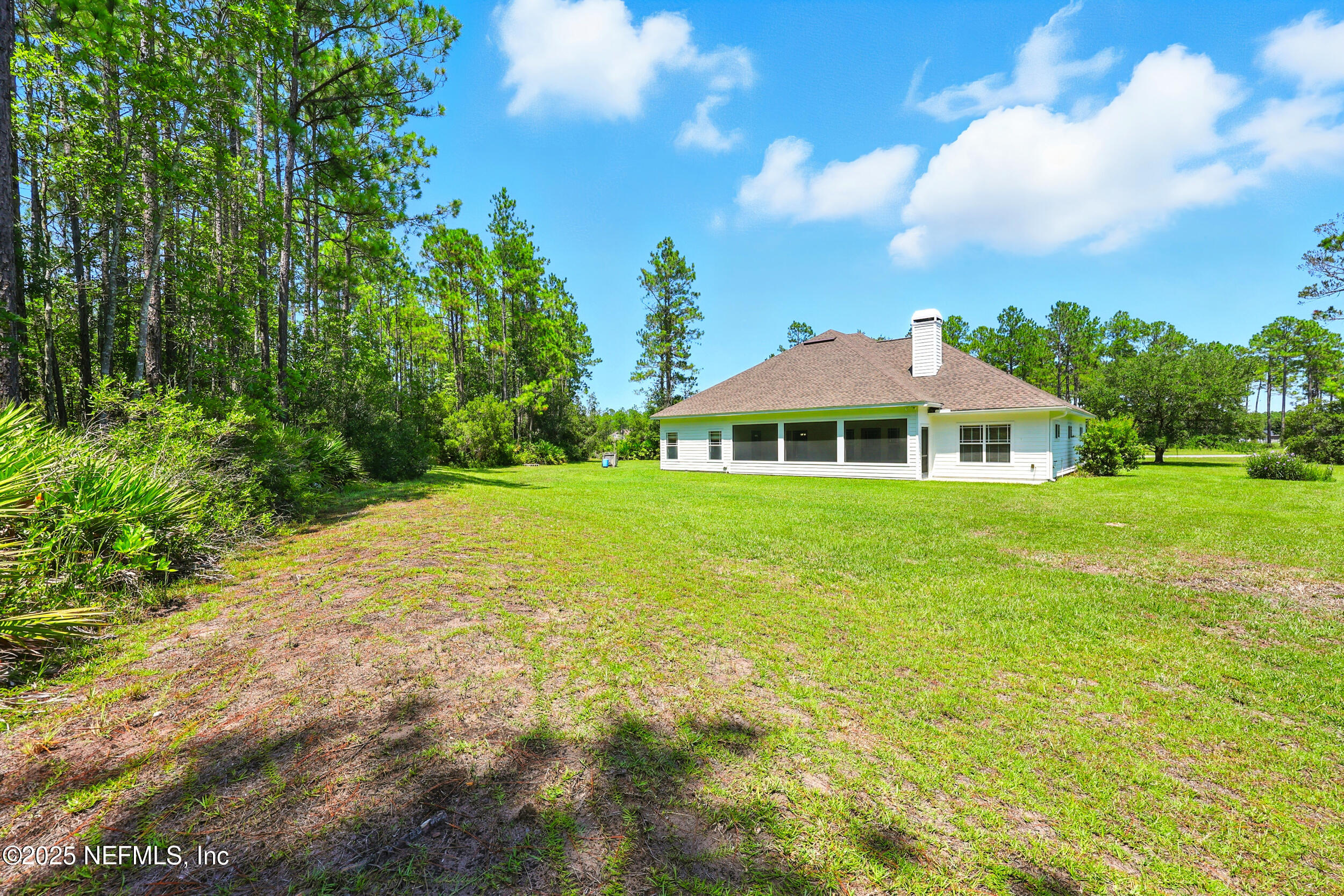 11062 Blazing Ridge Court Jacksonville, FL 32219 - Photo 42 of 55 Backyard with View of Rear Elevation