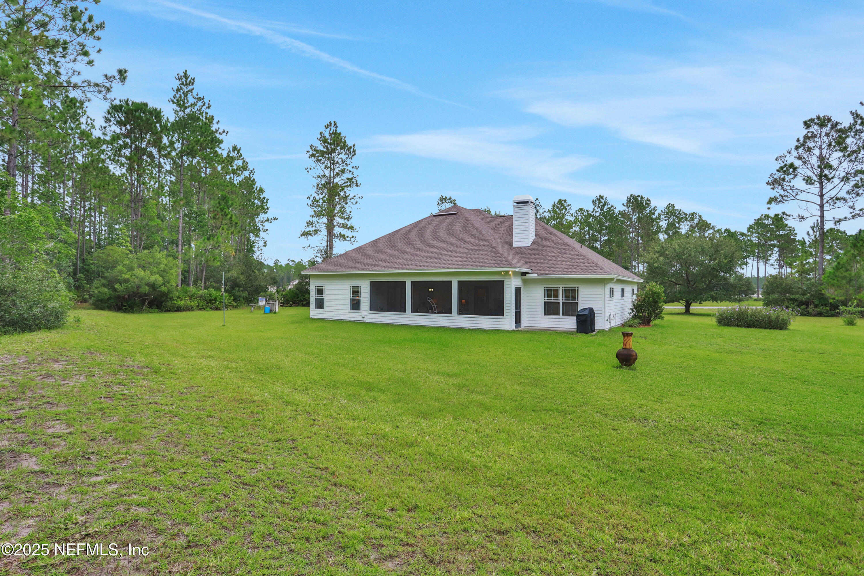 11062 Blazing Ridge Court Jacksonville, FL 32219 - Photo 44 of 55 Rear Elevation and Backyard