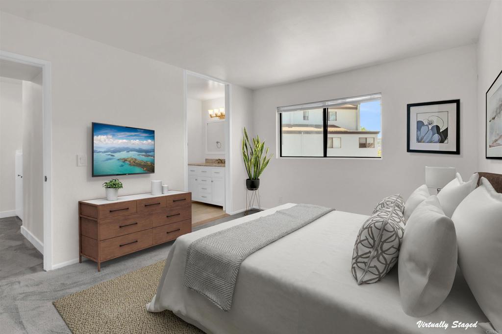 7321 Alicante Road, Unit A Carlsbad, CA 92009 - Photo 11 of 27 a bedroom with a bed and a dresser