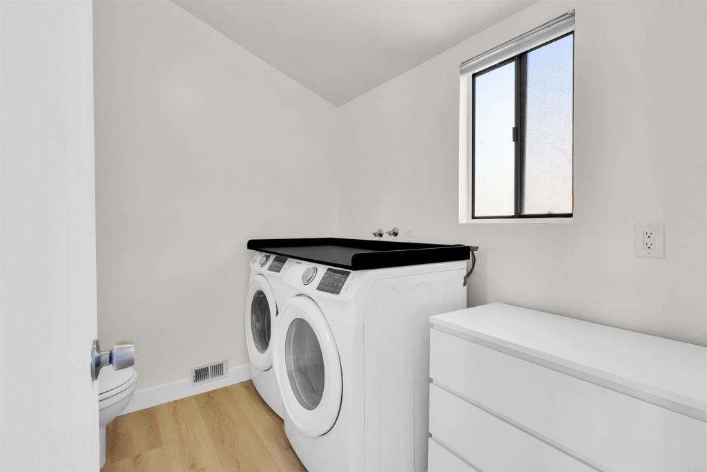 7321 Alicante Road, Unit A Carlsbad, CA 92009 - Photo 19 of 27 a utility room with dryer and washer