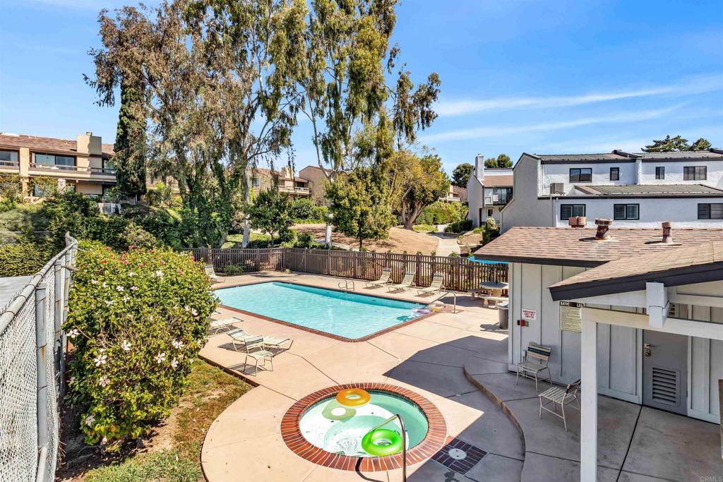 7321 Alicante Road, Unit A Carlsbad, CA 92009 - Photo 23 of 27 a view of a swimming pool with outdoor seating