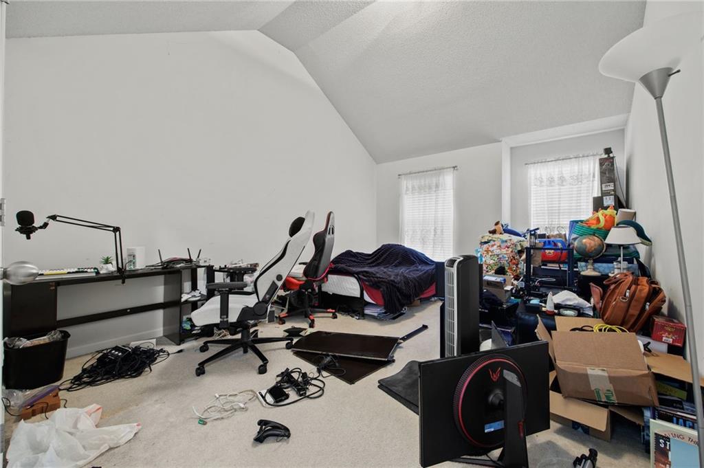 407 Grier Drive Locust Grove, GA 30248 - Photo 37 of 38 a view of a room with gym equipment