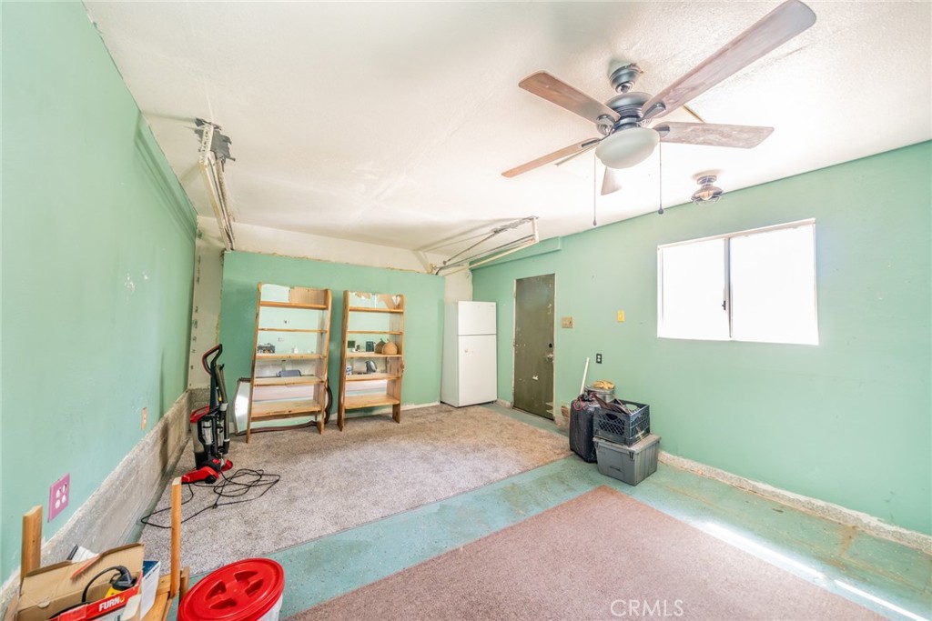 52647 Pine Cove Road Idyllwild, CA 92549 - Photo 22 of 35 a living room with furniture and a window