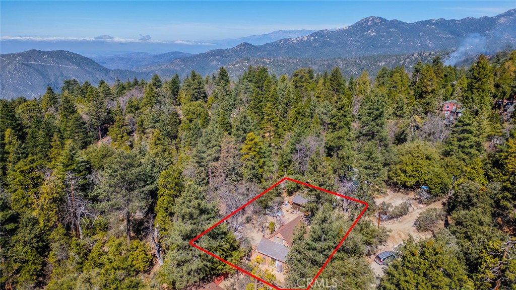 52647 Pine Cove Road Idyllwild, CA 92549 - Photo 33 of 35 a view of a lush green hillside and a houses