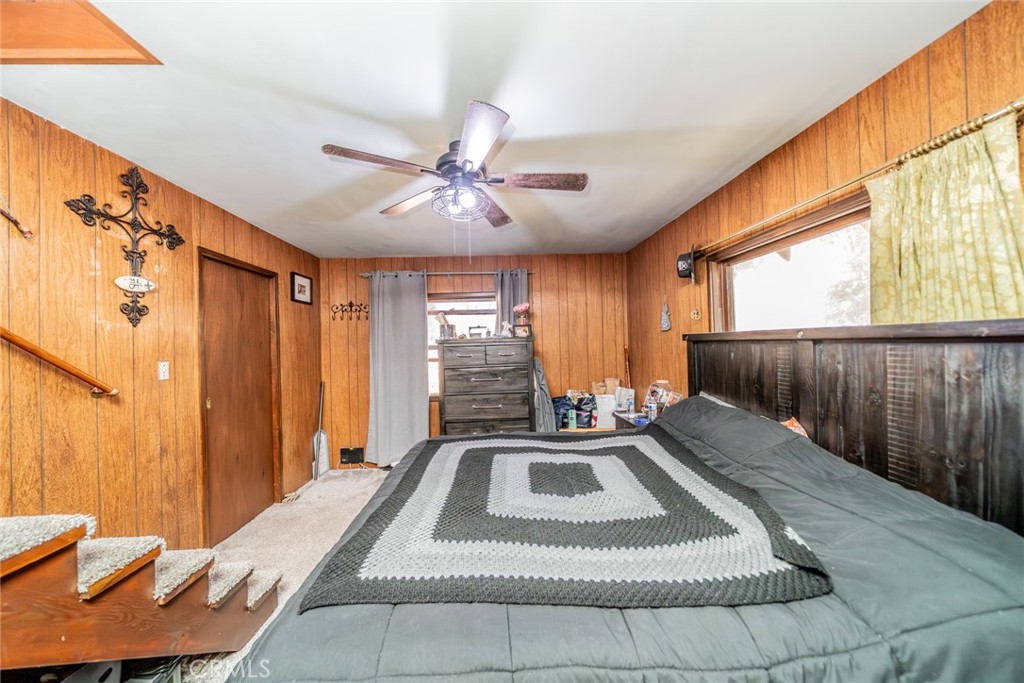 52647 Pine Cove Road Idyllwild, CA 92549 - Photo 8 of 35 a bedroom with a bed and a window