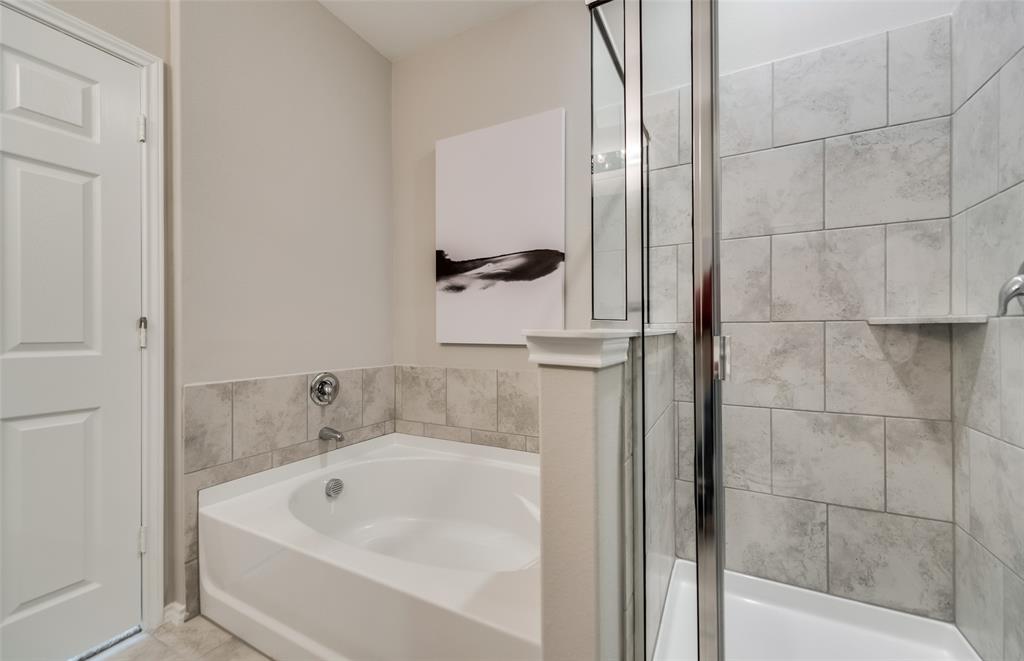 7509 Bent Gale Road Pilot Point, TX 76258 - Photo 13 of 26 a bath tub sitting next to a white sink
