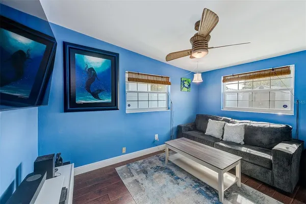 a living room with furniture and a window
