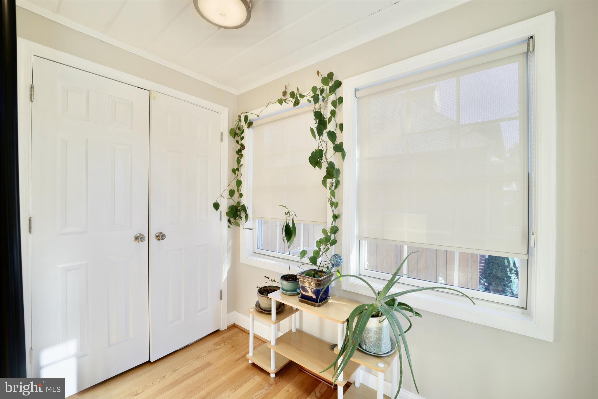 Foyer with large double door coat closet