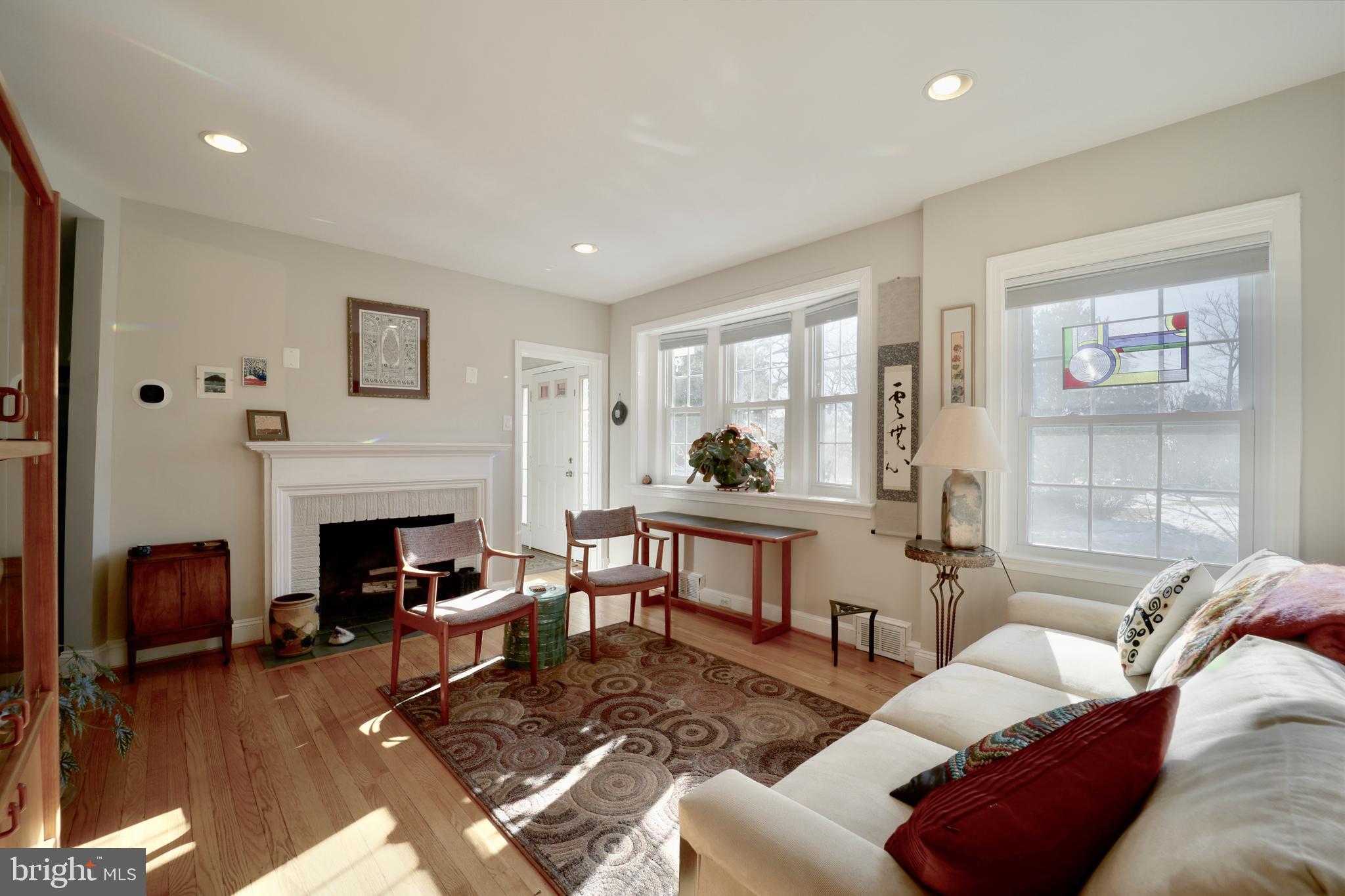 Sun drenched Living Room with fireplace
