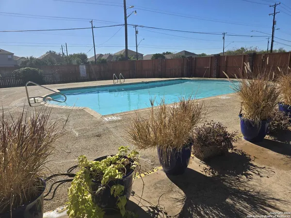 a view of a backyard of the house