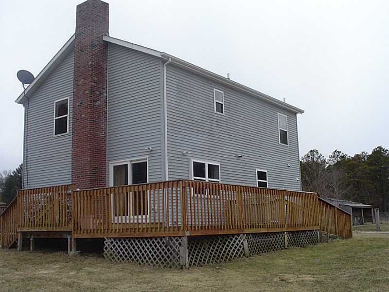 66 Gardner Road Charlestown, RI 02813 - Photo 2 of 12 Exterior Back.
