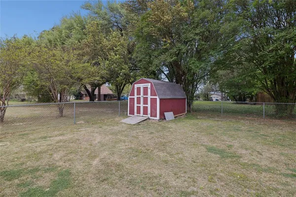 a view of backyard of house