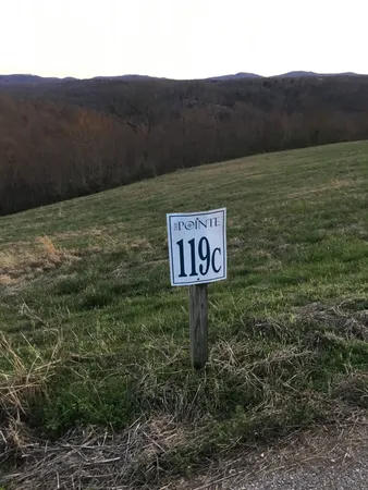 a view of a swimming pool from a balcony