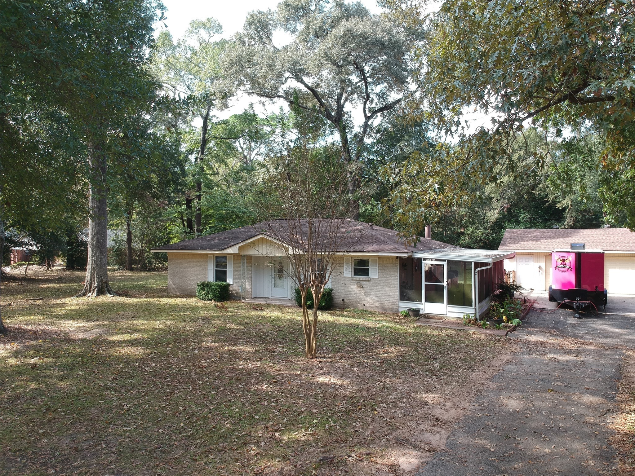 1651 Fultz Court Conroe, TX 77304 - Photo 35 of 38 a front view of a house with a yard