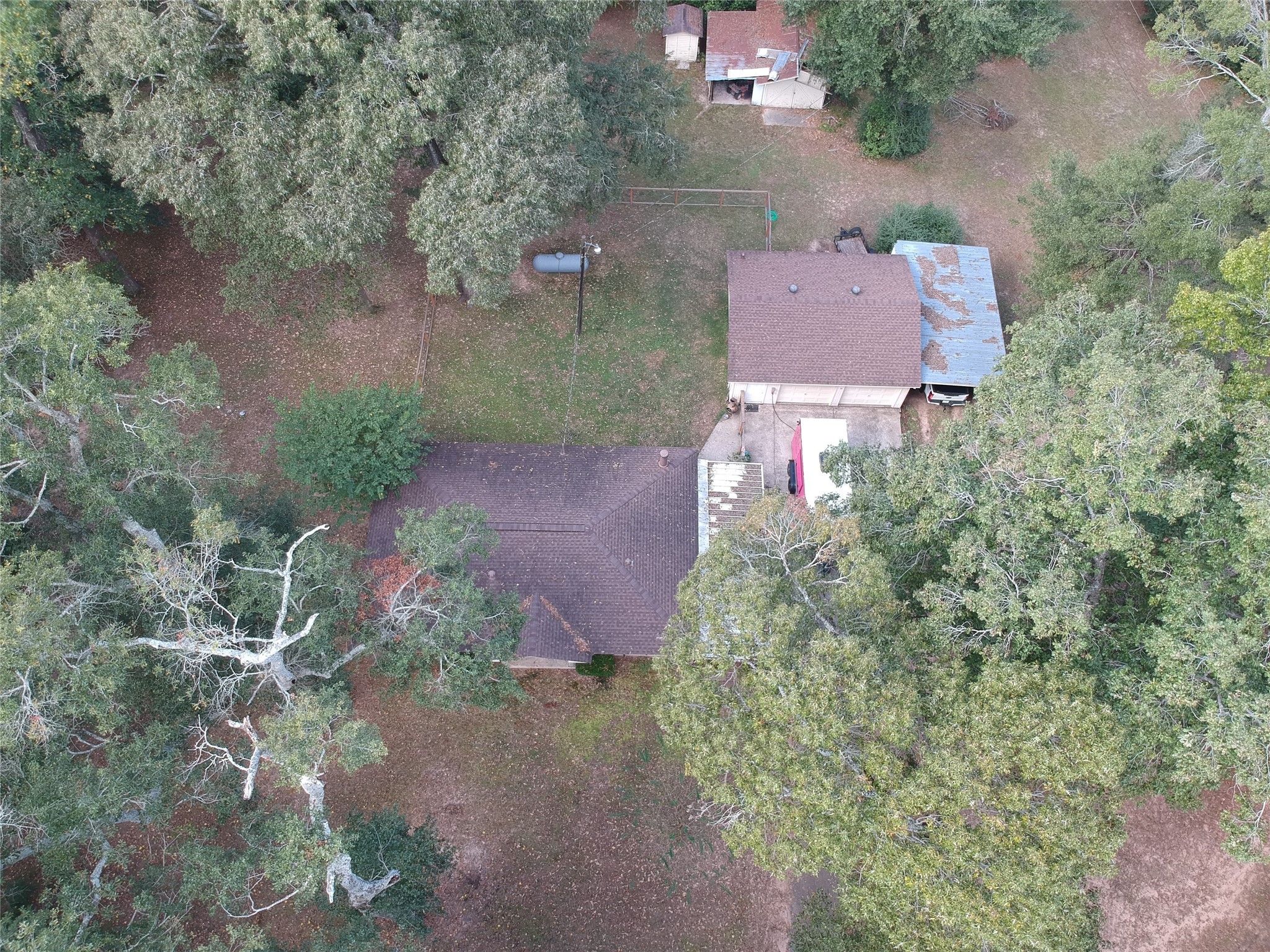 1651 Fultz Court Conroe, TX 77304 - Photo 38 of 38 an aerial view of a house with a yard