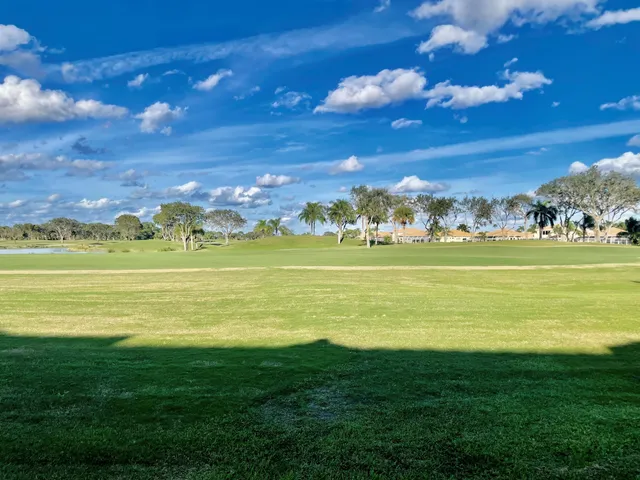 a view of an ocean and a yard