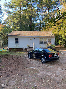 724 Oak Road Raleigh, NC 27603 - Photo 1 of 5 a car parked in front of a house