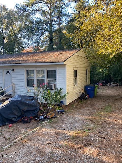 724 Oak Road Raleigh, NC 27603 - Photo 2 of 5 a front view of house with yard and trees around
