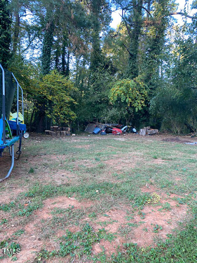 724 Oak Road Raleigh, NC 27603 - Photo 5 of 5 a view of outdoor space with playground and green space