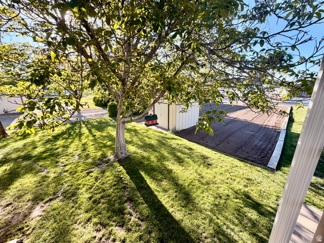 2298 West 800 North Clinton, UT 84015 - Photo 40 of 53 Manicured lawn with a mature deciduous tree