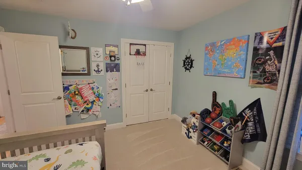 a bathroom with a shower toilet and sink