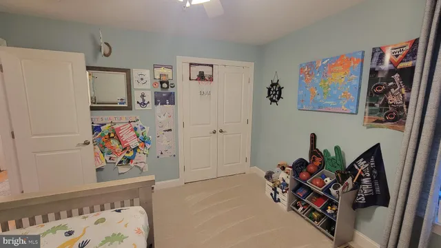 a bathroom with a shower toilet and sink