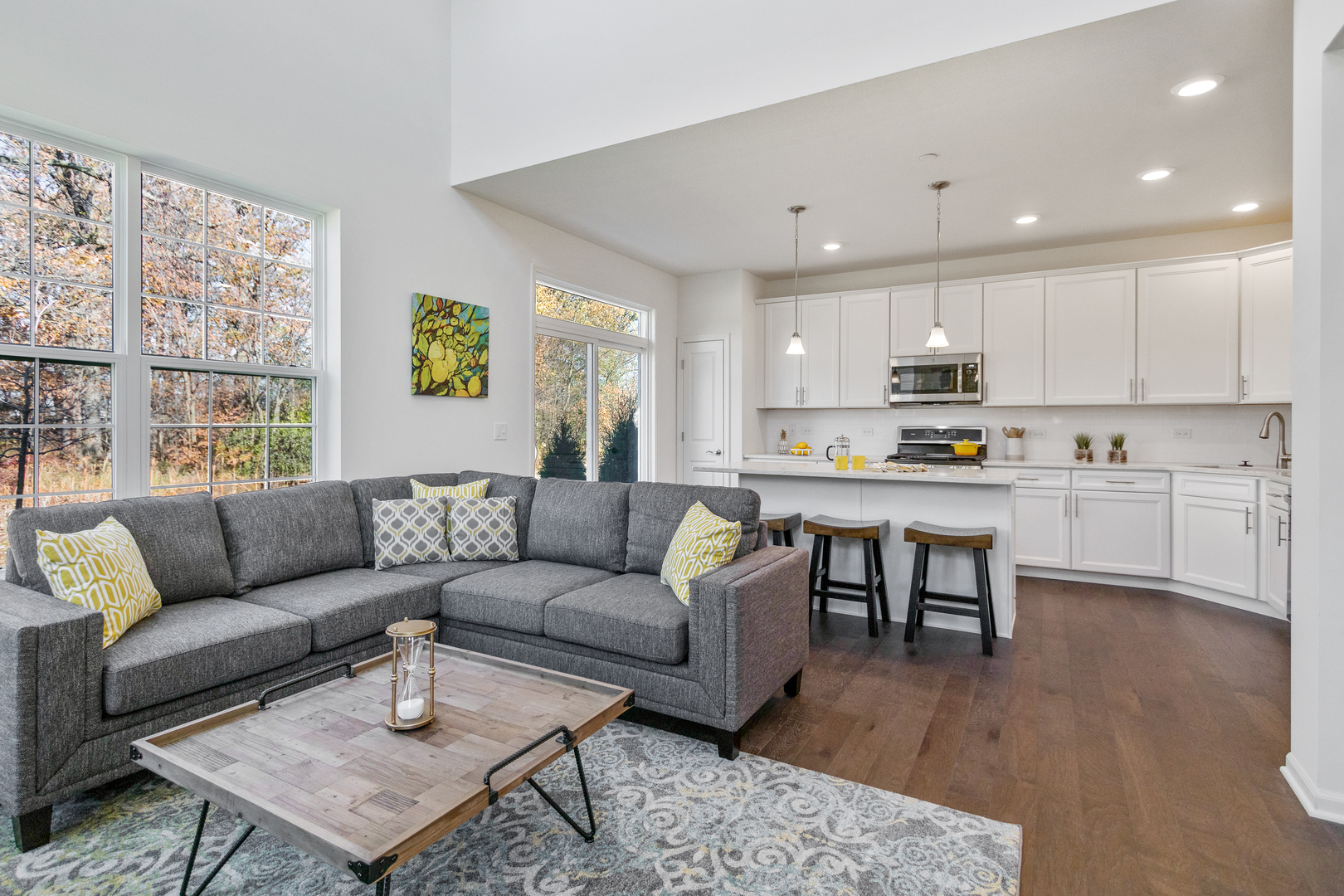 2041 Stuttle Road Batavia, IL 60510 - Photo 8 of 23 a living room with furniture wooden floor and kitchen view