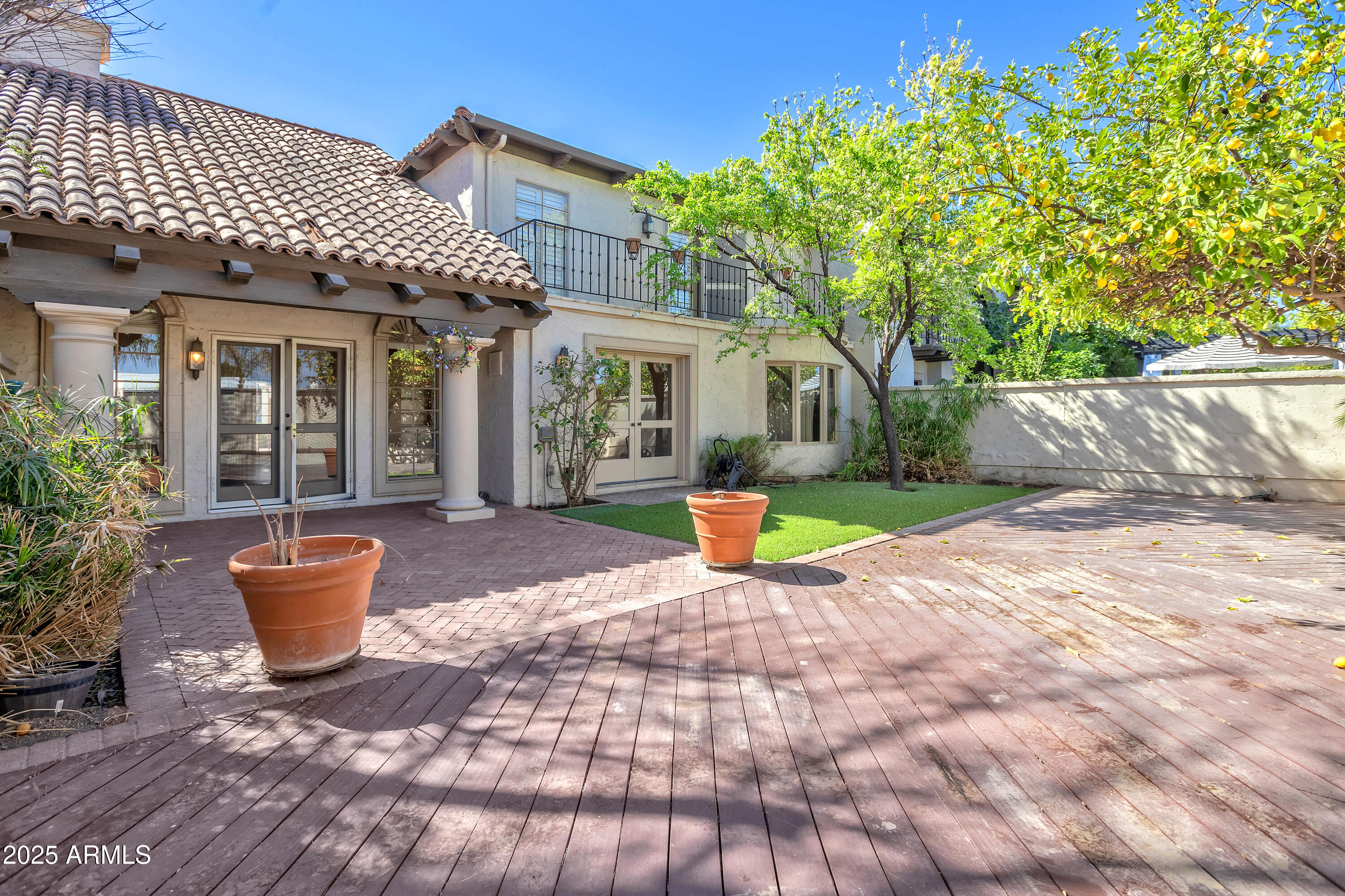 6701 North Scottsdale Road, Unit 23 Scottsdale, AZ 85250 - Photo 18 of 47 a view of a house with backyard and sitting area