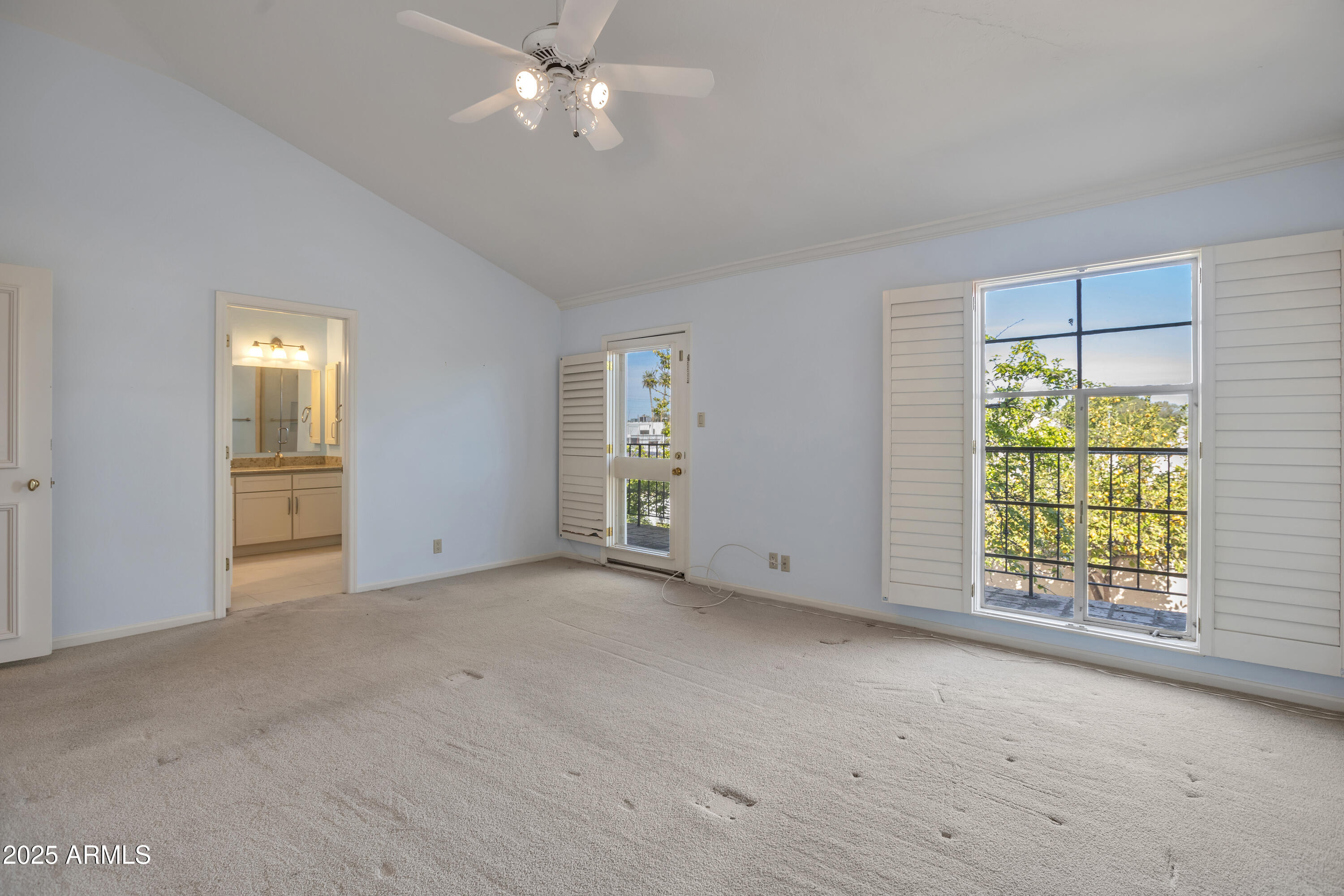 6701 North Scottsdale Road, Unit 23 Scottsdale, AZ 85250 - Photo 30 of 47 an empty room with windows and closet